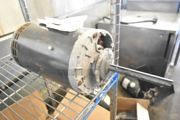 Two US Motors, models P63SYABZ-1159 and J63WZBKH-0246, for auction. 208-230/460V, 3-phase. Industrial use.