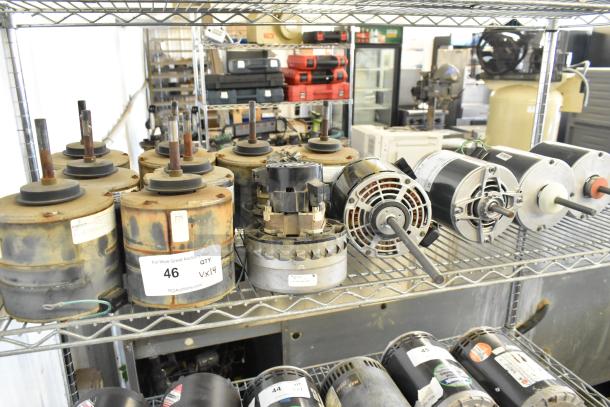 14 various electric motors on metal shelving, includes models with 380-420/460 volts, 1 phase; some rusted, marked "46 QTY X14."