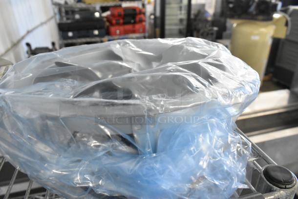 Two fan motors, including US Motors EC5472FP, wrapped in plastic, appear unused and in good condition.