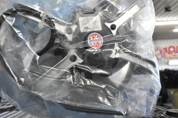 US Motors EC5472FP fan motor, new in packaging, features a durable design. Includes label with model details.