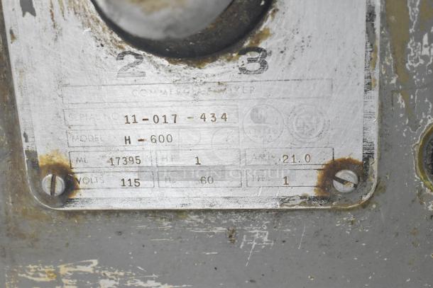 Hobart H-600 metal commercial 60-quart dough mixer nameplate, showing model, voltage, phase, and serial number details.