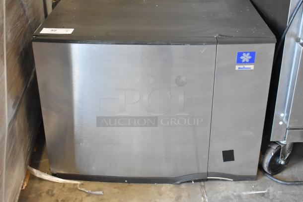 Manitowoc SD0452A stainless steel commercial ice head, 115 volts, 1 phase, in good condition. Visible Manitowoc logo on front.