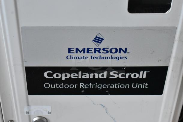 Emerson XFAM-030Z-CFV-081 outdoor refrigeration unit, 208-230V, 1 phase, Copeland Scroll logo on panel.