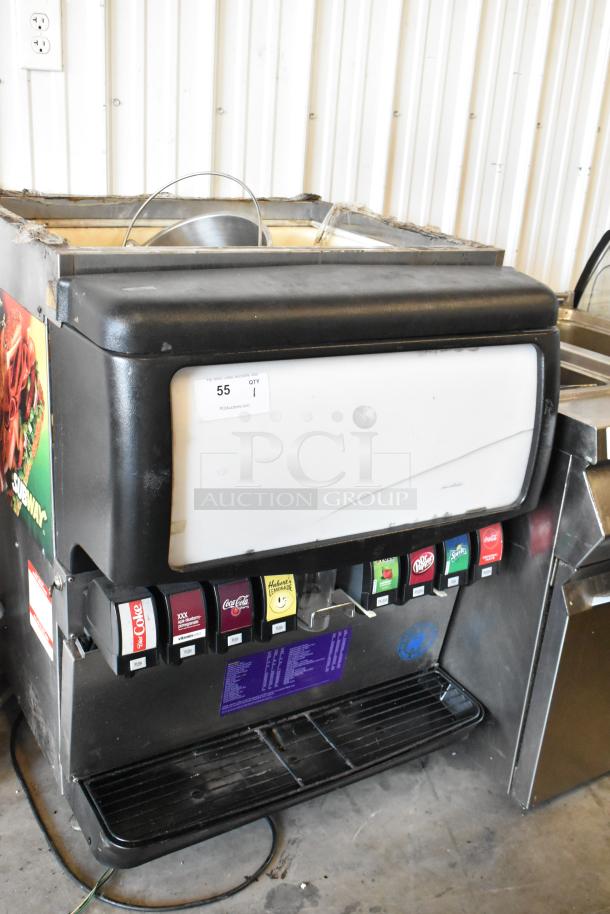 Cornelius ED200-BCHZ commercial beverage machine, stainless steel, 8 flavors, countertop, 115 volts, visible wear.