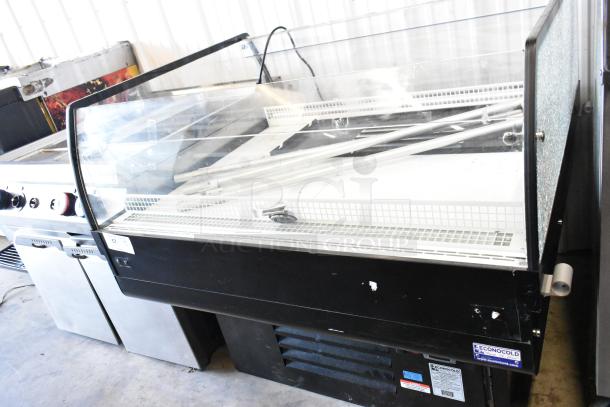 Econocold OM-IRSSCG island fridge with curved glass, commercial casters, 115V, 1 phase. Used condition, Econocold label visible.