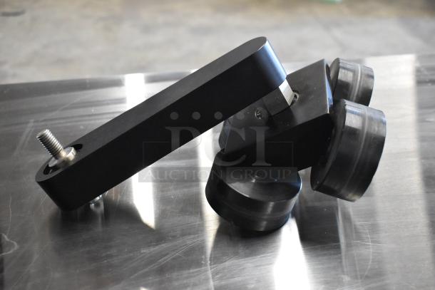 Black metal bracket with threaded bolt, part of auction item "4 Various Bags w/ Contents Including DTE FS-100 DVCPro."
