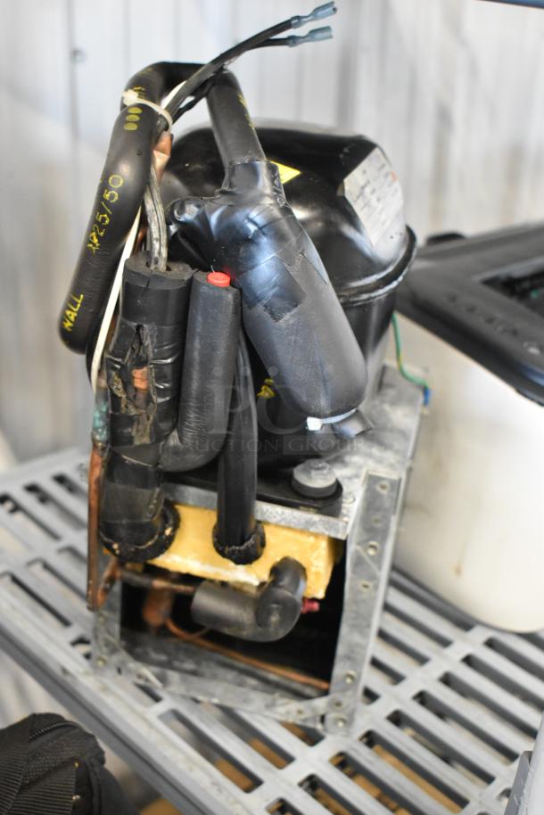 Baxter Mini K 1416 Compressor, 115 Volts, 1 Phase, in used condition. Visible cables and parts with identification markings.