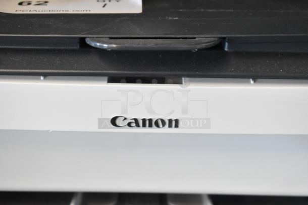 Canon F166500 Printer, visible Canon logo, black and white design, appears in good condition, auction tag partial view.