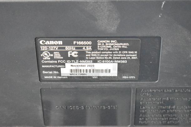 Canon F166500 Printer label showing model, voltage (120-127V), frequency (60Hz), and manufacturing date: November 2020. Made in Vietnam.