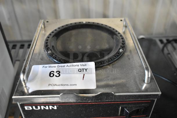 Bunn RWS1 stainless steel coffee pot warmer, single burner, commercial, 120 volts, used condition, auction tag visible.