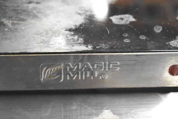 2023 Magic Mill MHPE905 hot plate, stainless steel, electric-powered. Visible wear on surface. Magic Mill logo etched.