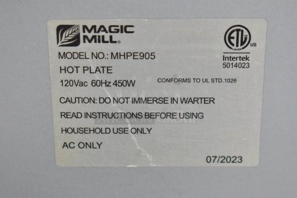 Magic Mill MHPE905 electric hot plate, 2023 model, 120V, 60Hz, 450W. Label shows caution and usage instructions.