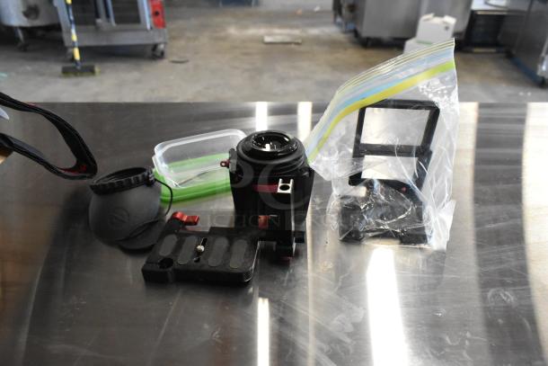 2 Boxes with Z Finder Pro Kit, clamps, various accessories in good condition on metallic surface.