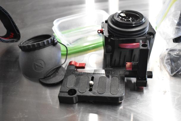 Z Finder Pro Kit with clamps on metal surface. Includes eyepiece, adjustable base, and protective covers. Good condition.