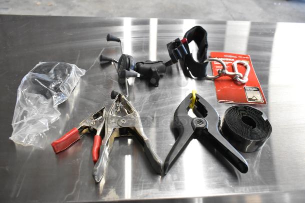Z Finder Pro Kit with clamps, Husky straps, and accessories, in good condition, displayed on a metal surface.