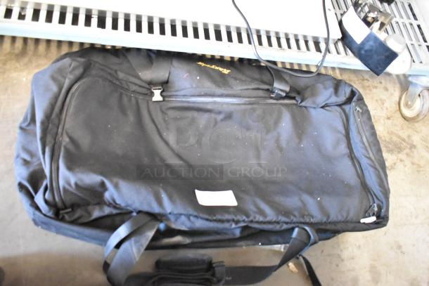 Easyrig black soft bag, zippered with straps, in used condition. Features visible Easyrig logo, suitable for equipment transport.