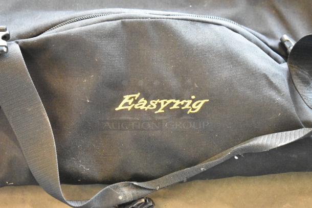 Easyrig Black Soft Bag featuring sturdy handles, zippered closure, and embroidered logo. Ideal for equipment storage.