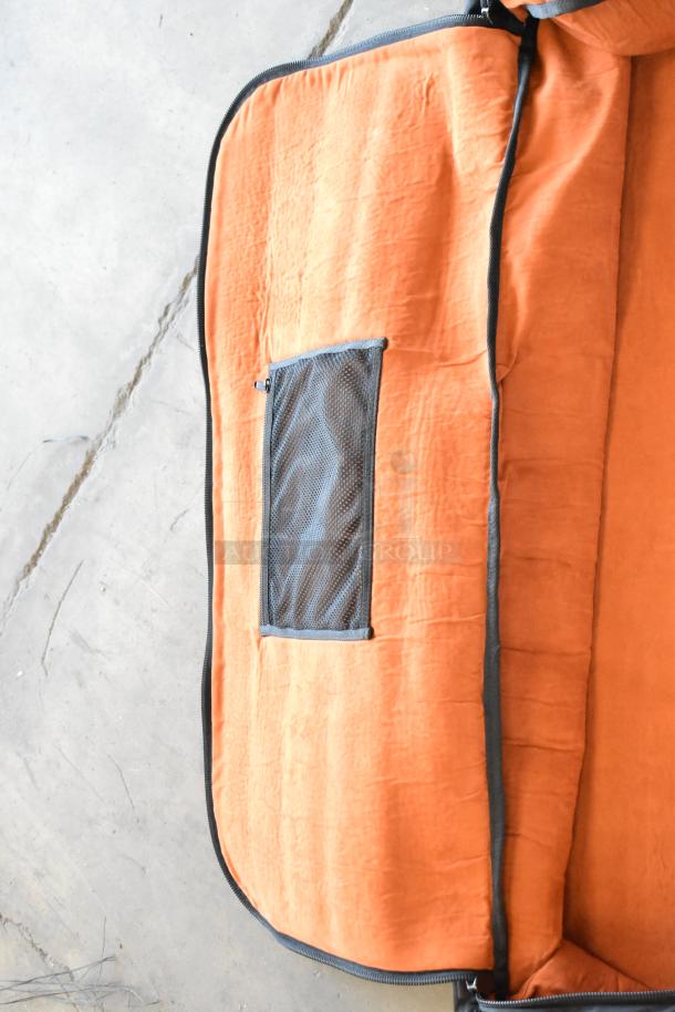 Easyrig Black Soft Bag with orange interior and mesh pocket, good condition, ideal for gear protection and transport.