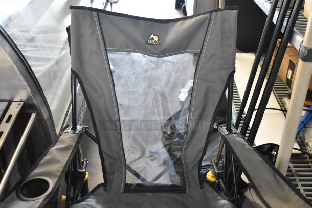 GCI Outdoor gray collapsible chair with cup holder, mesh back panel, and sturdy frame, logo visible.