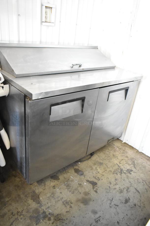 True TSSU-48-12 stainless steel commercial prep table, two-door, bain marie top, suitable for 115V, 1 phase use.