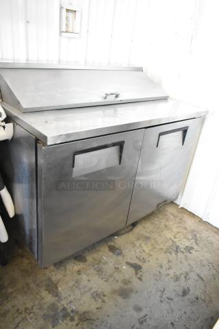 True TSSU-48-12 stainless steel commercial prep table, two-door, bain marie top, suitable for 115V, 1 phase use.