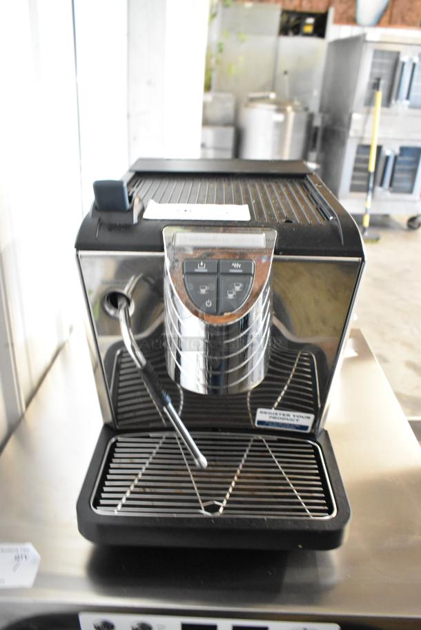 Brand new metal commercial countertop espresso machine with steam wand, scratch and dent condition.