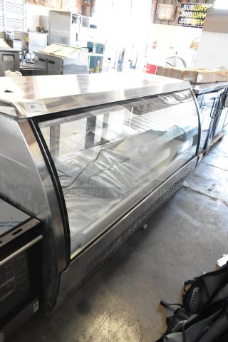 Brand new Avantco 178DLC82HCS 82" stainless steel refrigerated deli case with curved glass, 115V, 1 phase. Scratch and dent.
