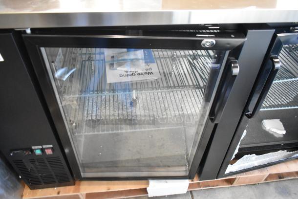 Brand new Avantco 178UBB4GHC 90" black glass door bar fridge with LED lighting; scratch and dent condition, broken glass visible.