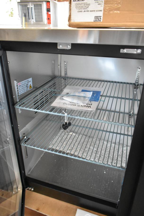 Brand new Avantco 178UBB4GHC back bar refrigerator, 90", black, with glass doors, LED lighting. Note broken glass shelf.