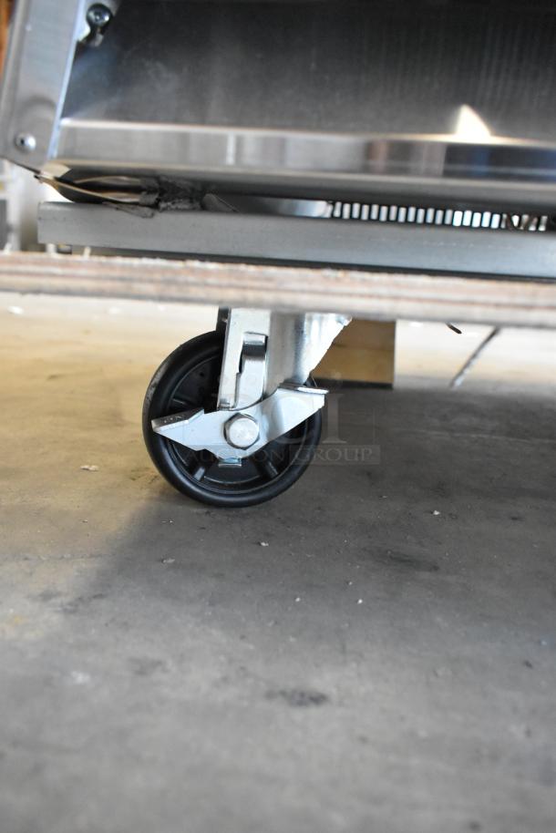 Brand new Avantco 178A49RHC stainless steel reach-in cooler caster. Scratch and dent condition. Poly-coated racks.