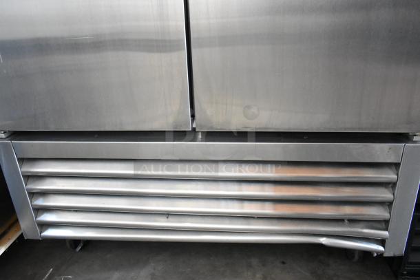 2017 True T-35-HC stainless steel commercial 2-door cooler with poly coated racks, on commercial casters. 115V, 1 Phase.
