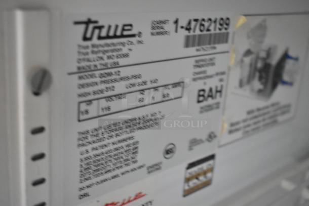 True GDM-12 cooler label showing model, voltage (115), phase (1), serial number, and certification details.