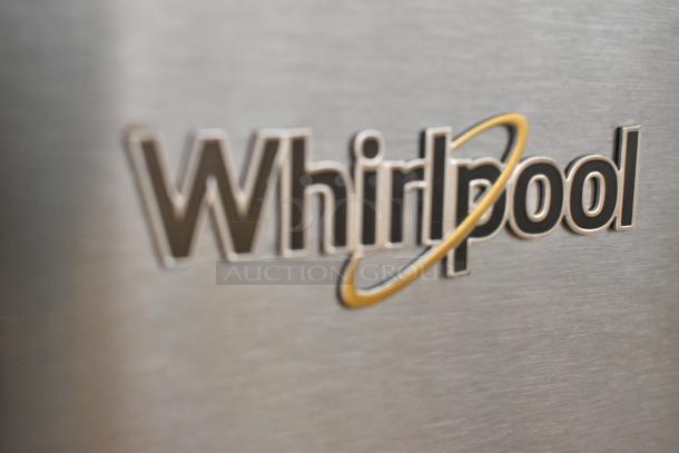 Close-up of Whirlpool logo on 2022 Whirlpool WRT311FZDM05 stainless steel cooler with freezer, 115 volts, 1 phase.