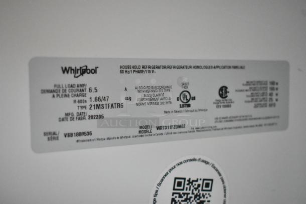 Label of Whirlpool WRT311FZDM05 cooler with freezer, showing model, voltage details, and manufacturing date.