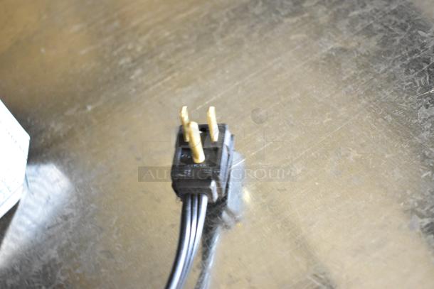 Power cord plug of 2022 Whirlpool WRT311FZDM05 Stainless Steel Cooler. 115 Volts, 1 Phase.