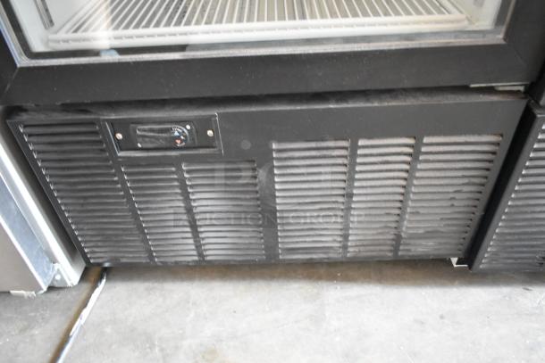 2019 Habco SE18 metal commercial cooler with single glass door, poly-coated racks, temperature dial, 115V, 1 phase.