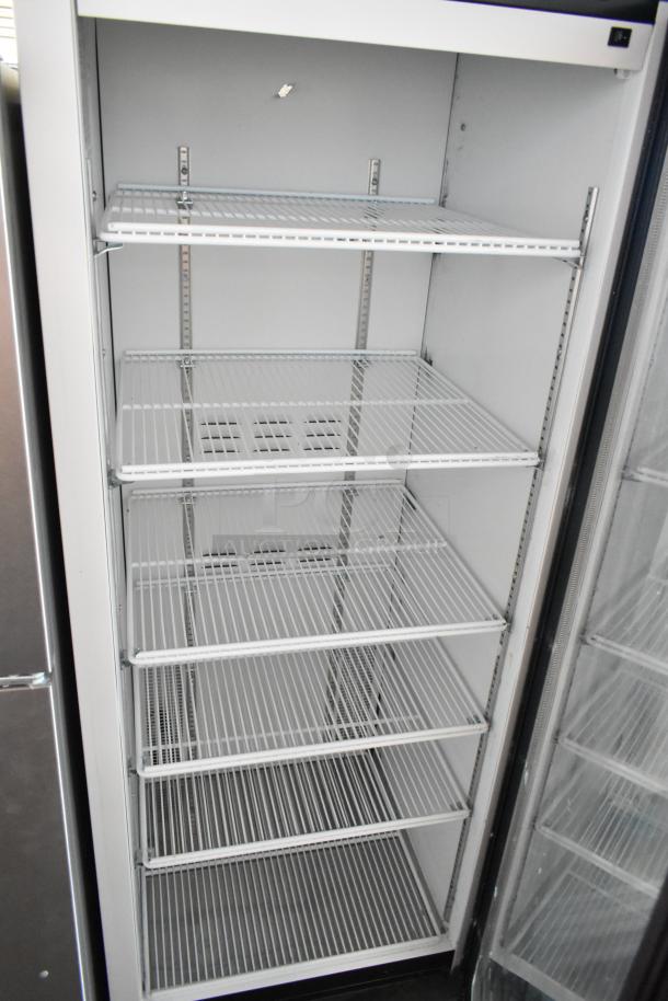 2019 Habco SE18 commercial reach-in cooler, single door, metal, poly-coated racks, 115V, excellent condition.
