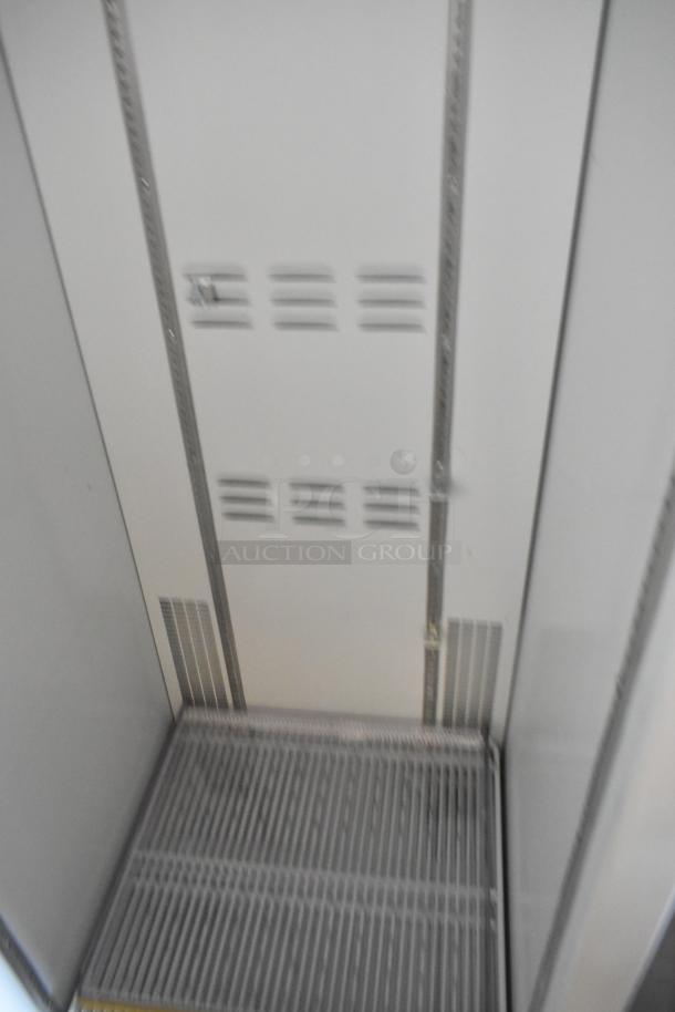 2019 Habco SE18 metal single-door cooler. Door needs reattachment. Includes poly-coated racks. 115V, 1 phase.
