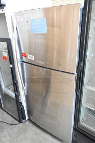 2016 Whirlpool WRT511SZDM00 stainless steel fridge with freezer, 115 volts, 1 phase, slight marks visible.