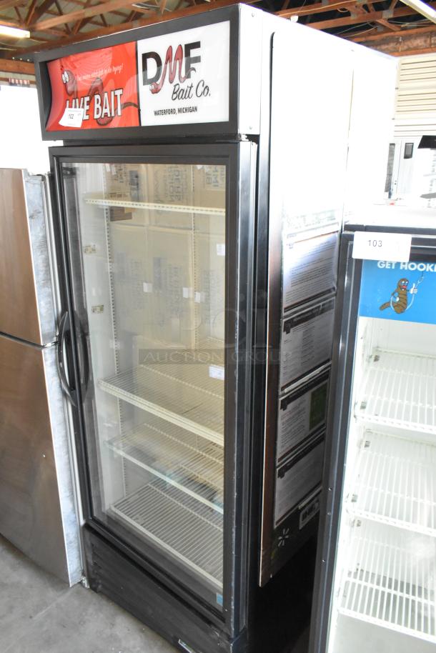 2019 True GDM-26-HC single door cooler, metal, poly-coated racks, 115V, 1 phase, good condition, DMF Bait Co. branding.