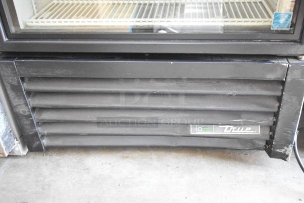 2019 True GDM-26-HC commercial cooler; single door, metal, poly-coated racks, True branding visible, 115V.