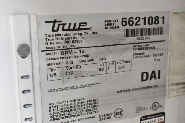 True GDM-12 Single Door Cooler Merchandiser label showing model, voltage, and serial number details. 115V, 1 phase.