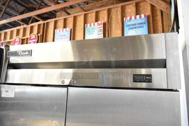 True stainless steel commercial 2-door reach-in cooler with poly coated racks, digital display, 115 volts, 1 phase.