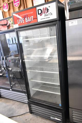 2020 True GDM-26-HC commercial cooler with single glass door, poly-coated racks, 115 volts, branded Live Bait signage.