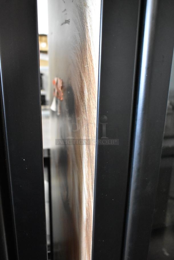 True Metal Commercial 2 Door Reach In Cooler, black frame highlighting side view detail, 115 volts, 1 phase.