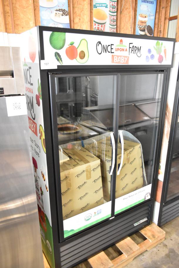 2025 True TVM-48SL-HC commercial 2-door reach-in cooler with metal shelves, branded "Once Upon a Farm." 115 Volts, 1 Phase.