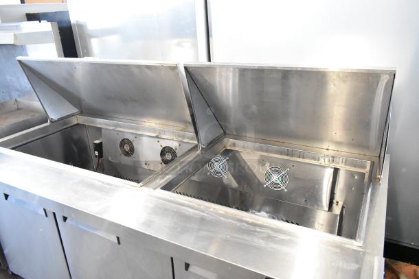 2018 Atosa MSF8308GR stainless steel prep table with open lids, 115V, commercial casters, excellent condition.