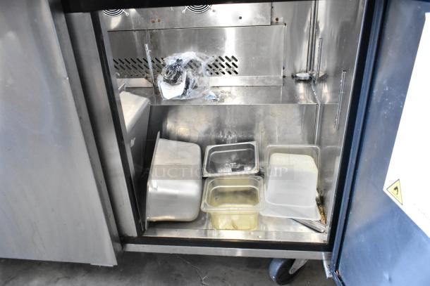 2018 Atosa MSF8308GR stainless steel sandwich prep table, mega top, on casters. Includes storage pans inside.