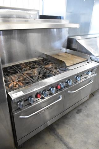 Black Diamond GR-6024G/NG stainless steel 6-burner range with right flat top griddle, 2 ovens, overshelf, backsplash, casters.
