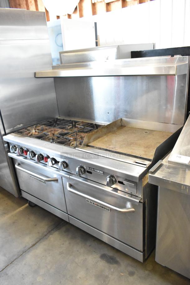 Black Diamond GR-6024G/NG stainless steel commercial gas range with 6 burners, right flat griddle, 2 ovens, and over shelf.